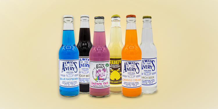 Avery's Shop All Collection Banner of colorful sodas in glass bottles on beige gradient background