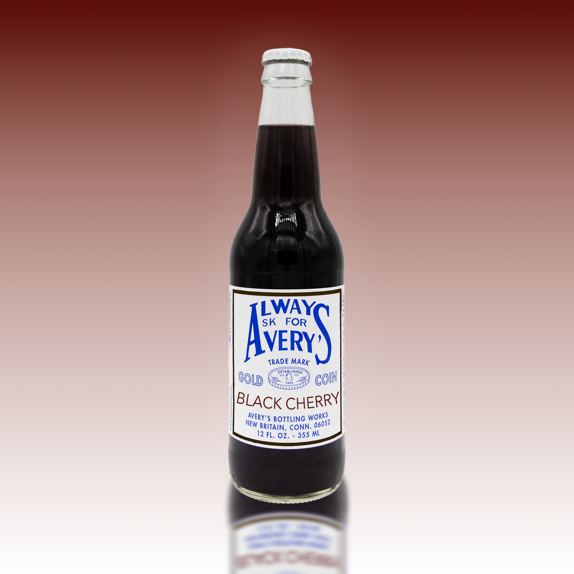 Avery’s Black Cherry Soda in glass bottle on deep red gradient background