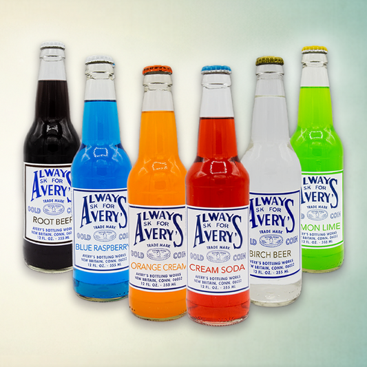Avery’s Classic Variety 12-Pack with a variety of classic flavors in glass bottles on gradient background