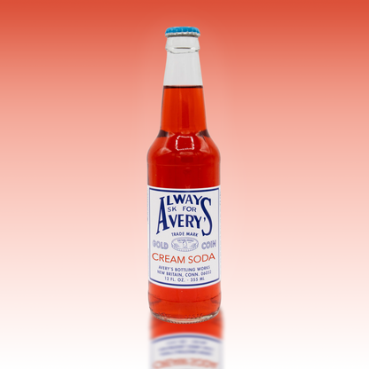 Avery's Cream Soda in glass bottle on red gradient background