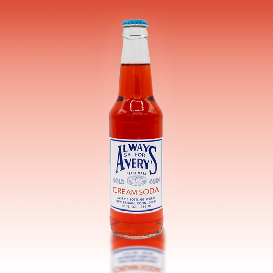Avery's Cream Soda in glass bottle on red gradient background