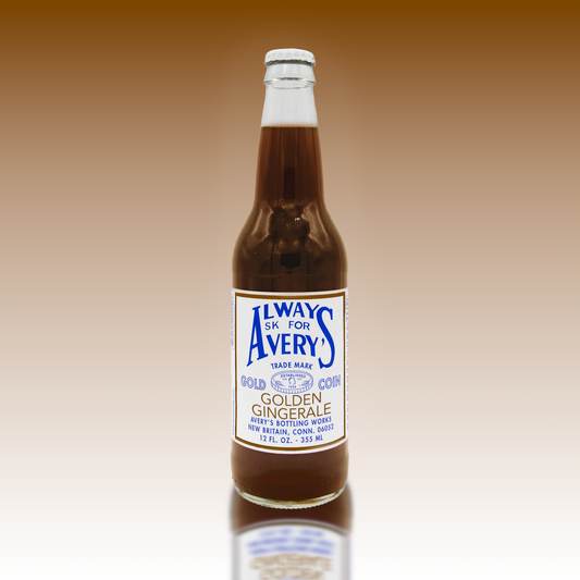 Avery’s Golden Ginger Ale in glass bottle on golden gradient background