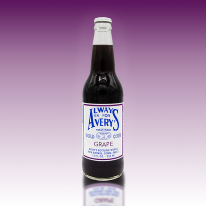 Avery's purple Grape Soda in glass bottle on purple gradient background