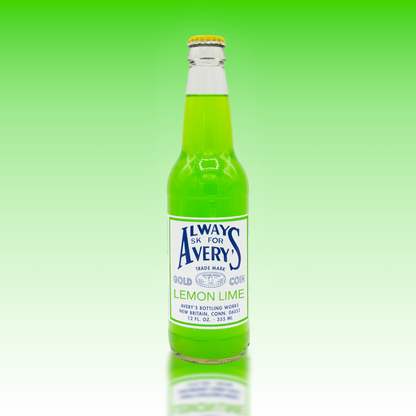 Avery's Lemon Lime green soda in glass bottle on green gradient background