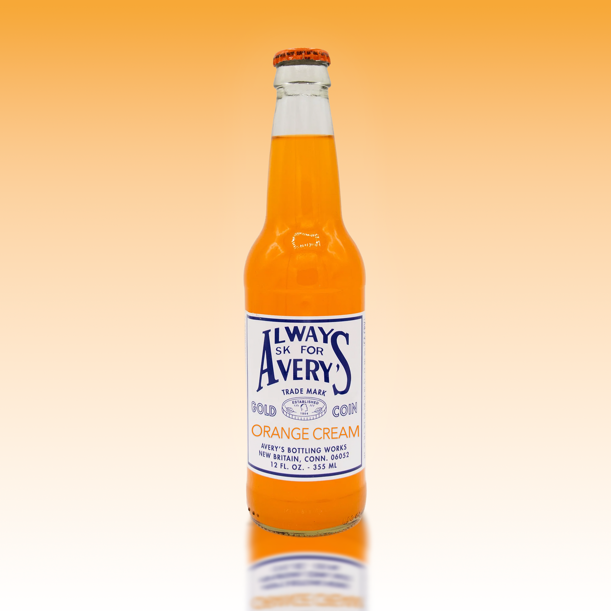 Avery's Orange Cream Soda in glass bottle on orange gradient background