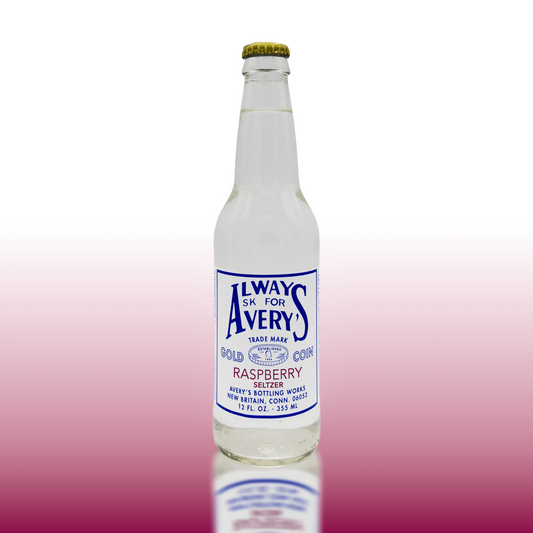 Avery’s Raspberry Seltzer in glass bottle on pink gradient background