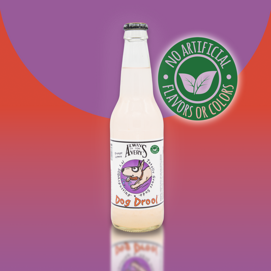 Avery's Totally Gross Dog Drool Natural soda in glass bottle on red and purple gradient background with "no artificial flavors or color" sticker 