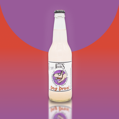 Avery's Totally Gross Dog Drool Original soda in glass bottle on red and purple gradient background