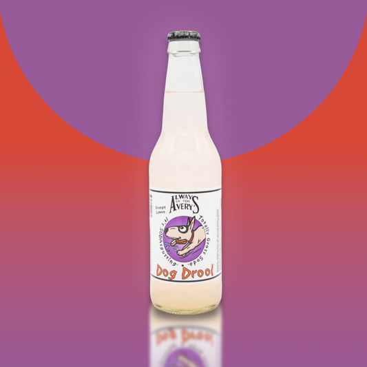 Avery's Totally Gross Dog Drool Original soda in glass bottle on red and purple gradient background
