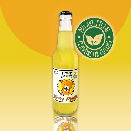 Avery's Totally Gross Kitty Piddle Natural yellow soda in glass bottle on yellow gradient background with "no artificial flavors or color" sticker 