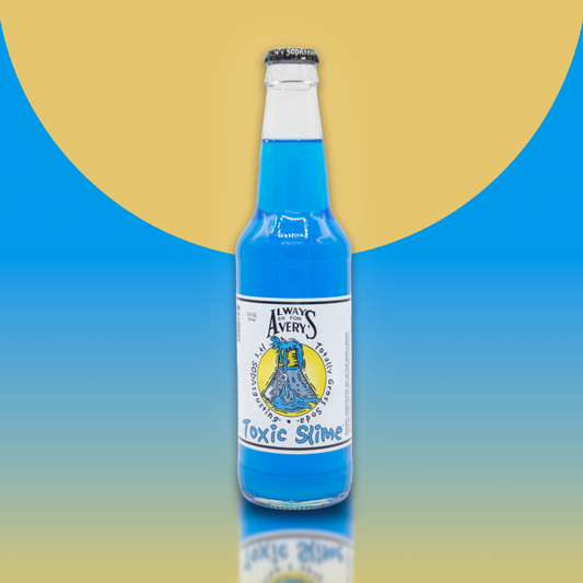Avery's Totally Gross Toxic Slime Original blue soda in glass bottle on blue gradient background